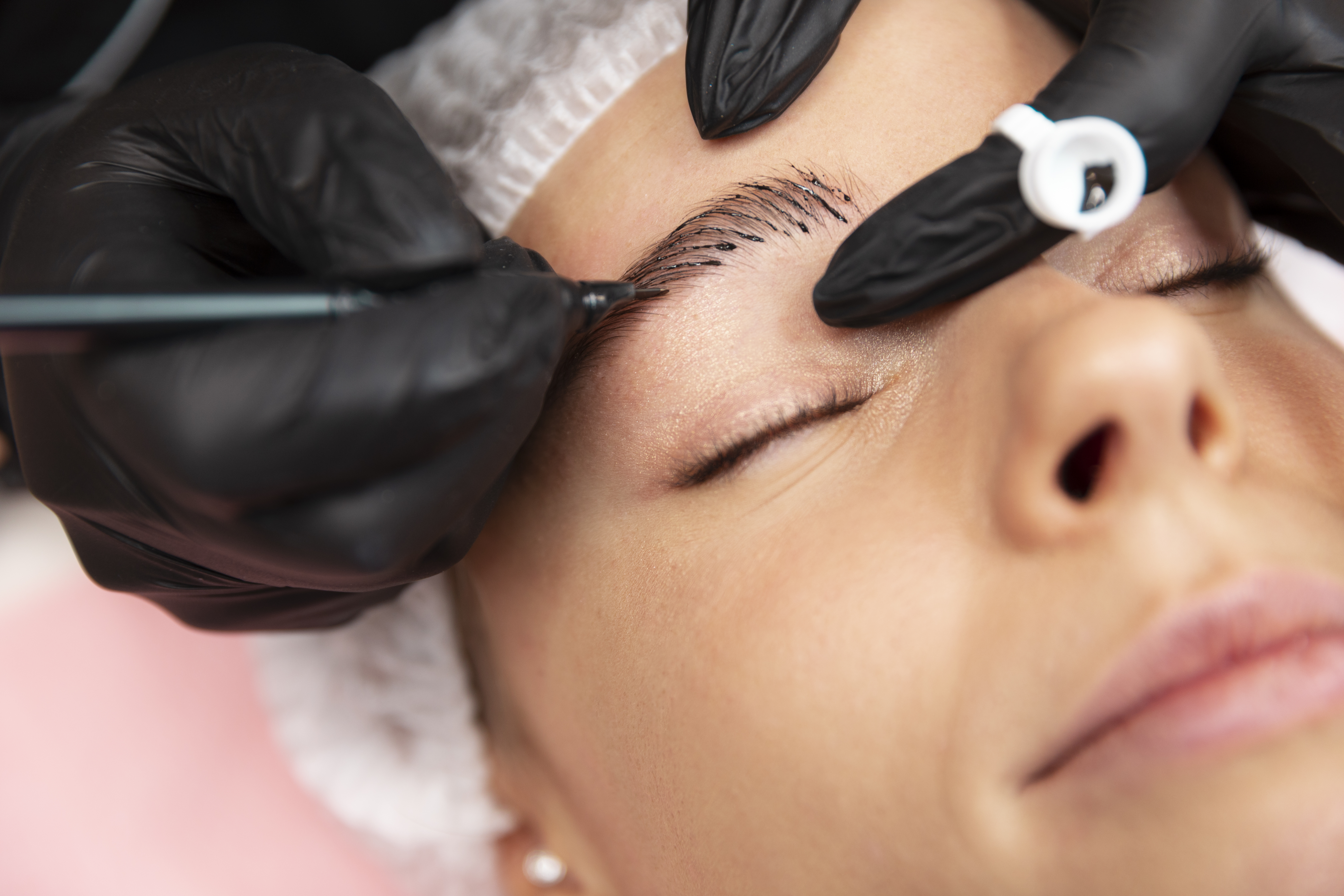 Eyebrow is being microbladed